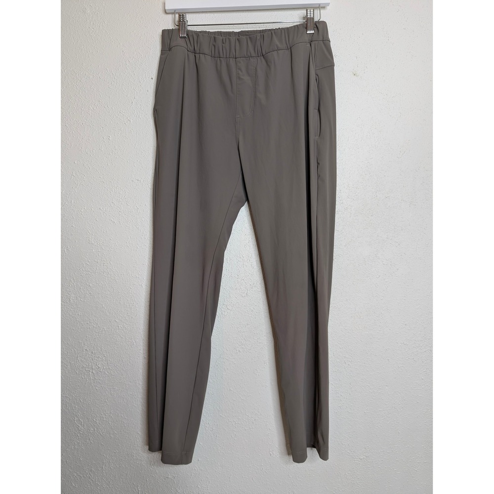 Vuori Miles Ankle Pants Womens Medium Tan Elastic Waist Zip Pocket Athletic